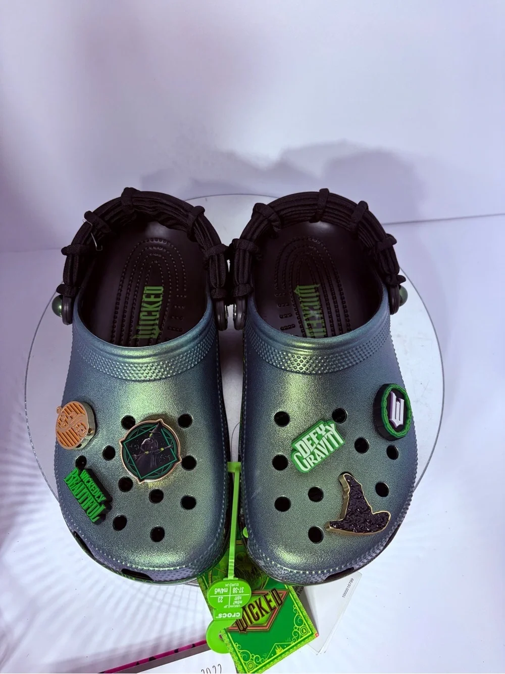CROCS Kids Iridescent Green Holographic Clogs with Charm Accents